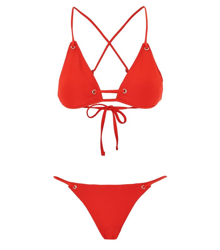 The Kardashians Just Hit the Beach in Swimwear We Could Actually All Wear