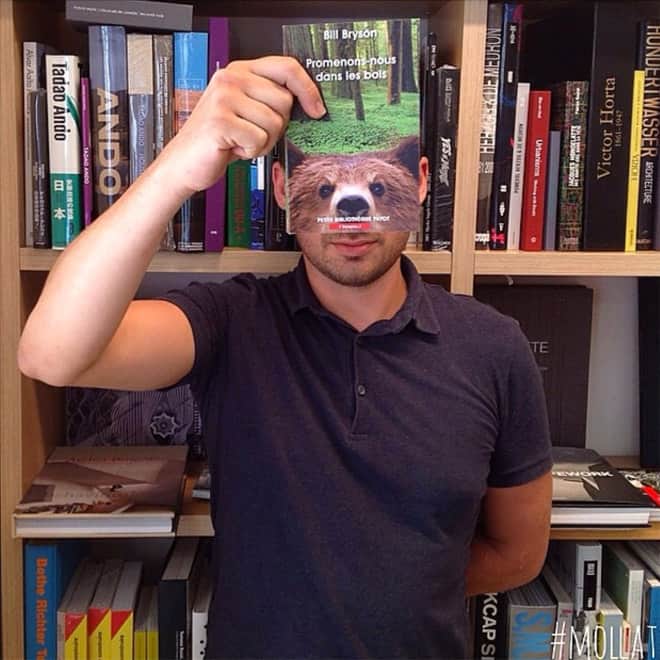 French Bookstore Librairie Mollat Customers Strategically Posing With Perfectly Matching Book Covers